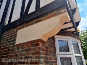 stone corbel replaced 300x225 - Crumbling Stone Corbels on Mock Tudor Property