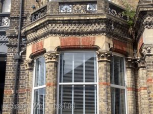 dropping cracking window arch 300x225 - Collapsing Ornate Bay & Balcony