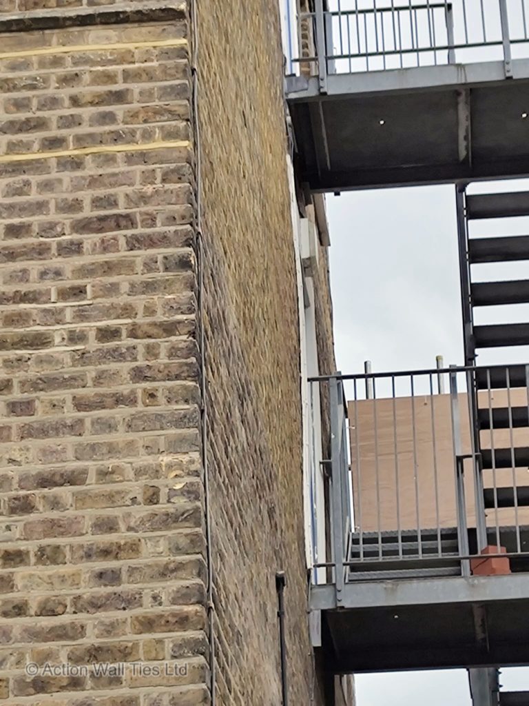 after brickwork realignment 01 768x1024 - London School with Bowing Brickwork