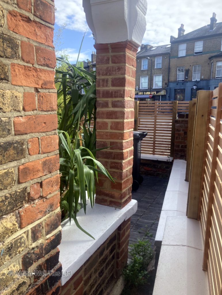 Repaired portico 02 771x1024 - Failing Brick Portico Columns & Arches