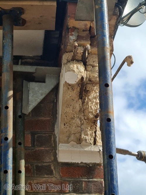 failing support corbels - Crumbling Stone Corbels on Mock Tudor Property