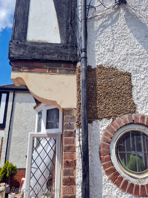 london corbel replacement - Crumbling Stone Corbels on Mock Tudor Property